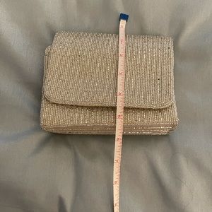 Silver evening bag with shoulder strap